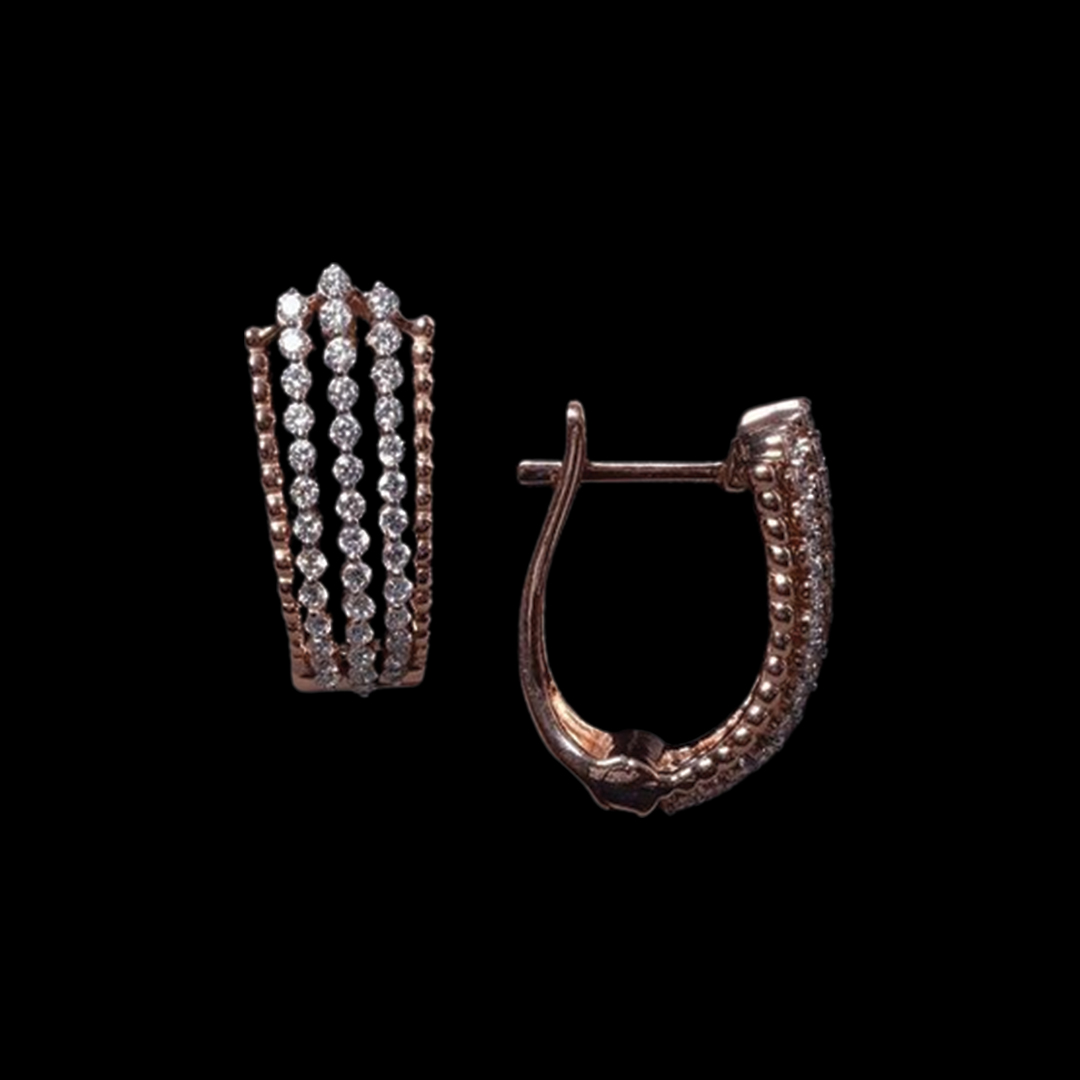 Gracefully aligned diamond earrings with stone settings in oval shape