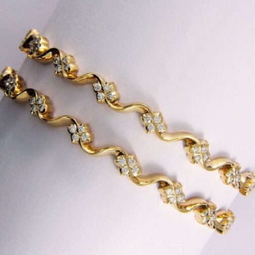 Wavy Gold and Diamond Bangles