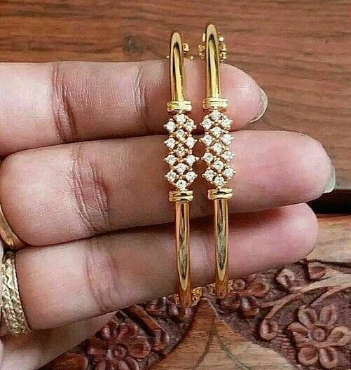 Impressive Gold Bangles with Diamond Jali Look