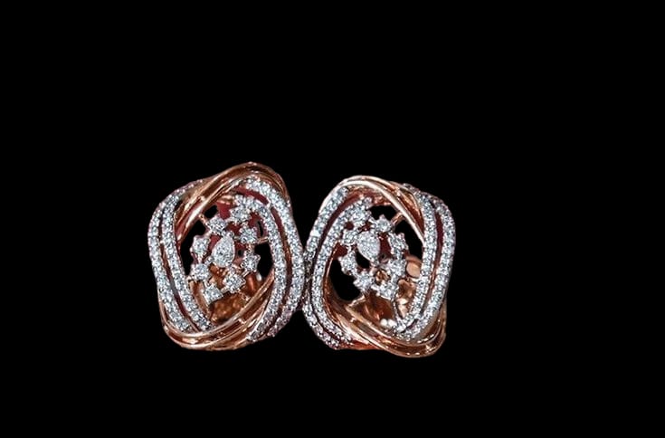 Indulge in timeless elegance with our designer diamond ear studs